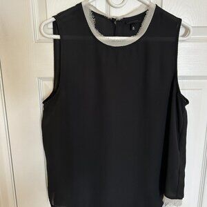 Black and White Who What Wear sheer sleeveless top with frayed edges